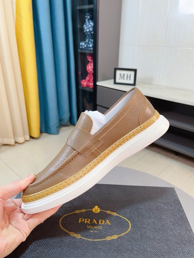 Prada Textured Slip-On Shoes